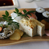Hassun: Snow Crab Sushi, seared Blowfish Sushi, Fish Roe rolled with Kelp, blanched Blowfish Skin served with Ponzu Sauce, Gisei-Tofu and Kumquats simmered in Syrup