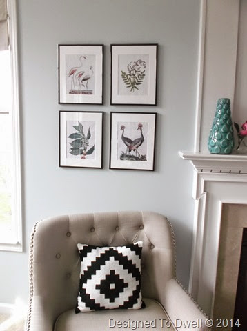 Art & Chair Flanking Fireplace