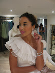 The Isaac Mizrahi cuff and Siman Tu chandelier earrings are perfect for this one-shoulder 
