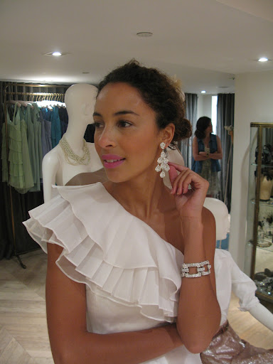 The Isaac Mizrahi cuff and Siman Tu chandelier earrings are perfect for this one-shoulder 