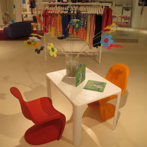 A cute kids table. The wire flowers add a cool, whimsical edge.