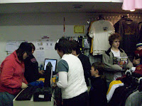 Customers buying items at The Edge 2 on Black Friday.