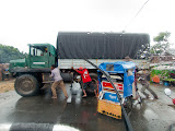 I also never expected to see guys trying to push a truck this big across the middle of the road! They blocked up traffic for a while, but eventually they did get the vehicle across the road... must not be as heavy as it looks! Madagascar6 - 112.jpg