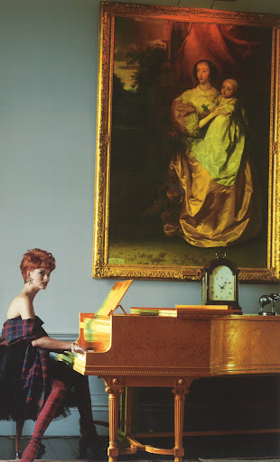 Linda Evangelista in Isaac Mizrahi's strapless blue tulle dress, with tartan shawl and tartan hose. Photograph by Arthur Elgort/Vogue.