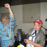 DJ Jeff Allen of Beach Front Radio seems to have said something to excite Tall Paul of Ramajay Intercoastal. Ramajay was our band for the party and they did a SUPER job as well as did DJ Jeff. DJ Jeff Allen of Beach Front Radio seems to have said something to excite Tall Paul of Ramajay Intercoastal. Ramajay was our band for the party and they did a SUPER job as well as did DJ Jeff.