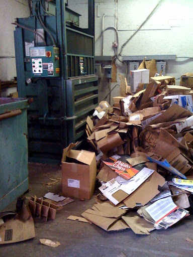 Cardboard boxes wait to be bailed at the Willow Springs Recycling Center.  After bailing, the cardboard is ready to be sent off to be recycled.