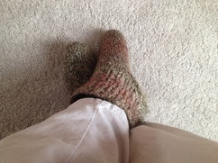 c0 My feet on Thanksgiving morning, wearing the slippers my wife knitted for me our first Christmas together