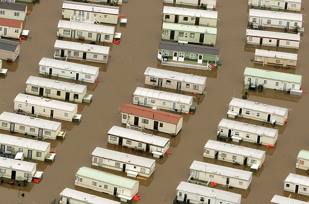 Homes in Tiddlington lie under several feet of water. Photo: Lee Sanders / Photoshot / Landov