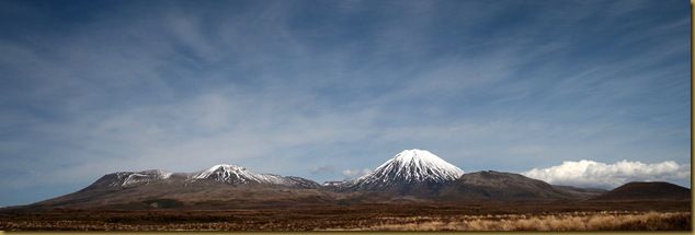 Mount Ngauruhoe (right) and Mt Tongariro (left). Ngaurahoe also known as Mt. Doom :). We live about a five minute drive from this view. Expect to see more pictures like this!