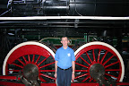 Dad dwarfed by a locomotive