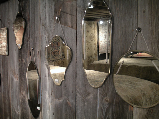 These mirrors are hanging on a wall in the rug room.  The shapes are so simple and beautiful.