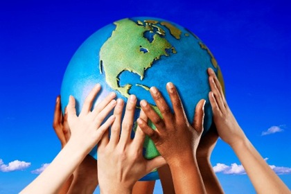 Hands on a globe Hands on a globe --- Image by © Royalty-Free/Corbis