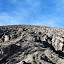Hikers reach the bottom of the steep descent from Semeru - 2.5 hours up, 30 mins down