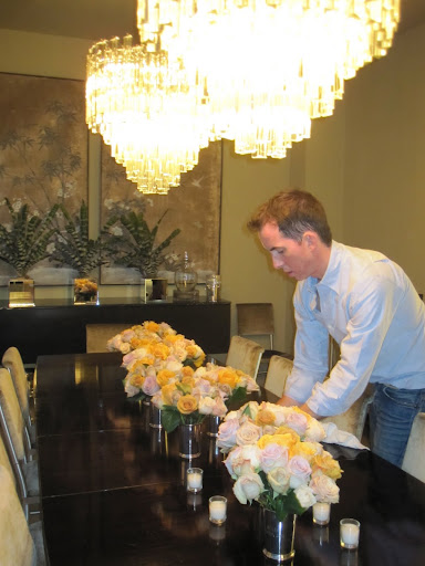 here I am making sure the flowers are arranged in the best way on my dining room table.