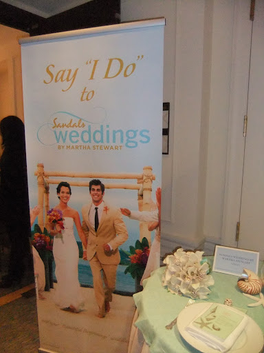Sandals Weddings by Martha Stewart displayed three of the table designs available at their resorts.