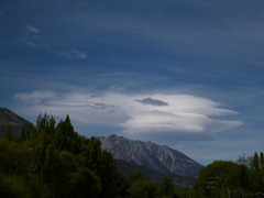 Crazy lenticular clouds mean lots of wind.