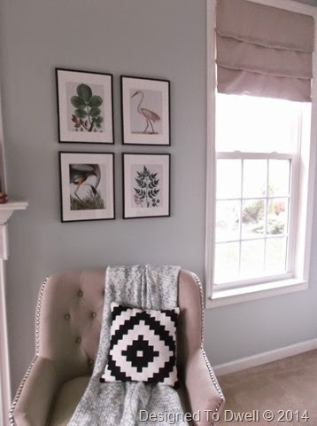 Art & Chair Flanking Fireplace