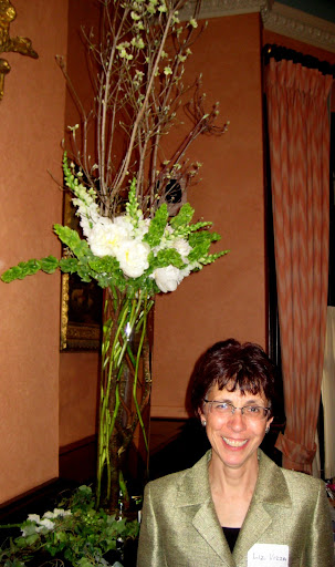 Liz Vizza of Friends of The Public Garden, with her Tall Door Prize