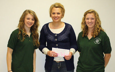Christina Waters received a donation County Council vice president, Lexi Marek and president, Sarah Altenhofen presented the check to Waters.  Photo Courtesy:  Washington County Extension.