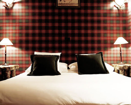 I'm loving the plaid wallpaper in Le Lodge Park hotel in Megeve, France (photograph from apartmenttherapy.com).