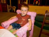 Matimu sitting in a high chair at a restaurant in Tamatave. He seem to love feeling like a big boy! Madagascar6 - 101.jpg