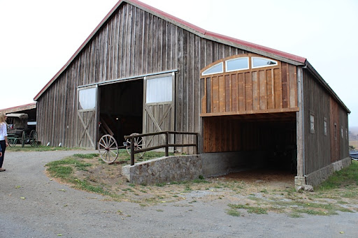 Their amazing barn. Can't you just picture huge drapes of fabric hung up over the entrance? Their amazing barn. Can't you just picture huge drapes of fabric hung up over the entrance?