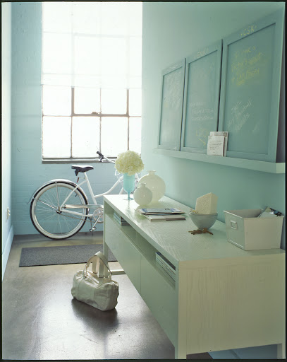 An entry should always include a landing place for keys, mail and other everyday essentials.  A low console gives a modern look.
