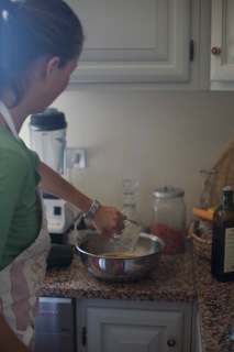 Adding together the flour mixture, zucchini, and carrots and the wet ingredients.