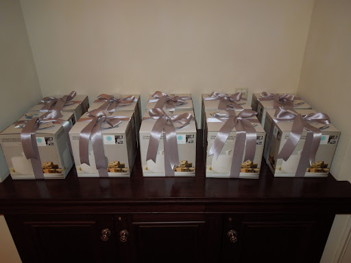 Guests took home cake domes from the Martha Stewart Collection at Macy's along with boxes of mini whoopie pies from One Girl Cookies as favors.