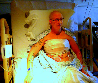 The surgery leaves three drains and a big wrap.