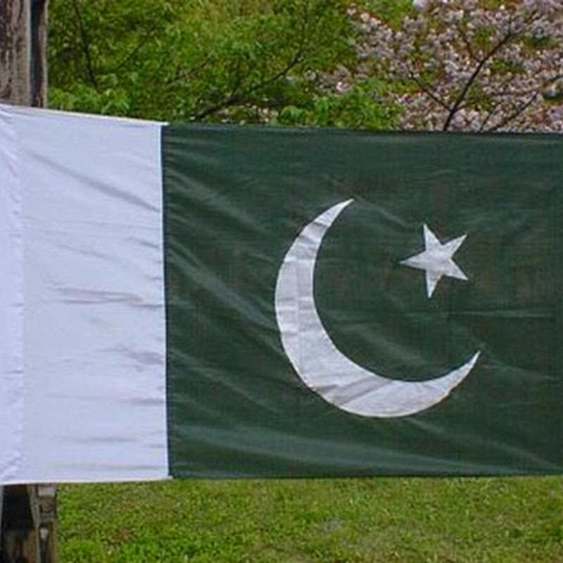 Woman opening the New Pakistani Flag