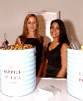 The girls from the Hampton Popcorn Company never thought they would run out of their sweet and savory varieties of popcorn with those enormous buckets, but by the end of the night they were cleaned out! The popcorn was served in custom printed bags by For your Party (seen on the table). The girls from the Hampton Popcorn Company never thought they would run out of their sweet and savory varieties of popcorn with those enormous buckets, but by the end of the night they were cleaned out! The popcorn was served in custom printed bags by For your Party (seen on the table).