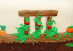 Trellis and tomatoes on side of cake