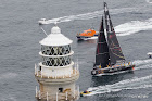 IRELAND, Fastnet Rock. 2nd July 2012. Volvo Ocean Race, Leg 9, Lorient to Galway. Abu Dhabi Ocean Racing rounds the Fastnet Rock.