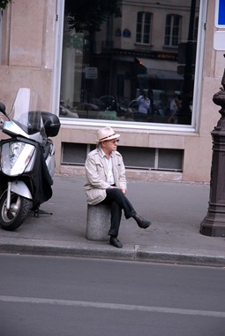 Sitting on a bollard