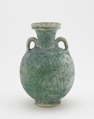 Rakka type ware bottle | Origin:  Iraq | Period: 11th-12th century | Details:  Not Available | Type: Earthenware with turquoise alkali-silicate glaze colored by copper | Size: H: 16.6  W: 11.2  cm | Museum Code: F1910.26 | Photograph and description taken from Freer and the Sackler (Smithsonian) Museums.