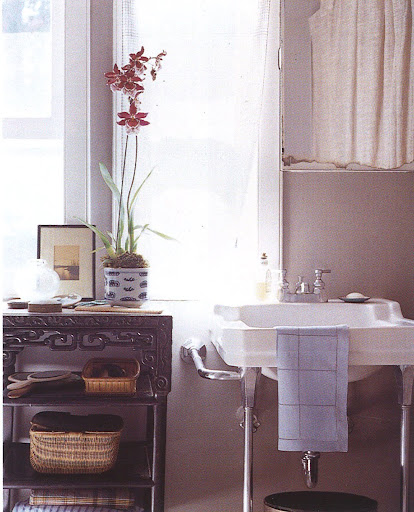 I'm a sucker for carved-wood furniture in the Chinese-export style.  Wicker and orchids also a must.