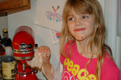 Batter Faced Girl Cleaning the Mixer