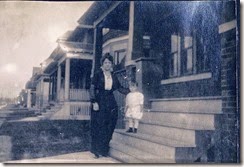 Dad with his mother on the steps_circa 1914