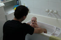 Bathtime with Daddy is a riot