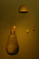 Priests placed groups of objects as offerings inside pottery containers of various different shapes.