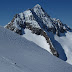 Renato skiing with the Fleckistock in the background