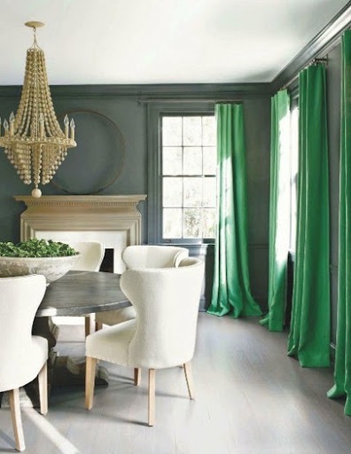 I adore the bright green curtains. They are such a dramatic way to introduce color into a neutral room. http://pinterest.com/pin/161566705351628582/