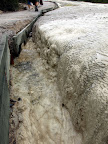 The edge of Wai-O-Tapu Geyser.