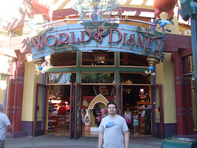 Cameron in front of World of Disney