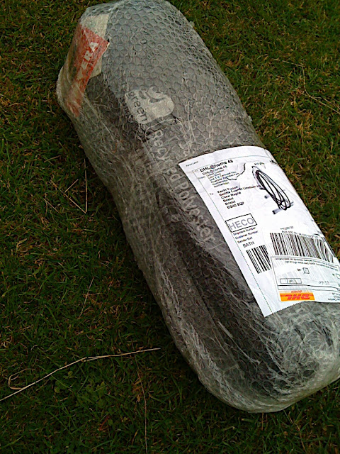 The tent arrives by courier, from greenoutdoors.co.uk - its a small package for a tent.