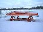 Boat by the winter bank Boat by the winter bank