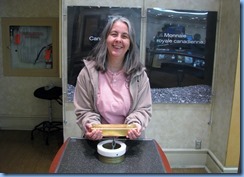 6347 Ottawa  Sussex Dr - Royal Canadian Mint tour - Karen holding gold bar weighing approx 28 lbs