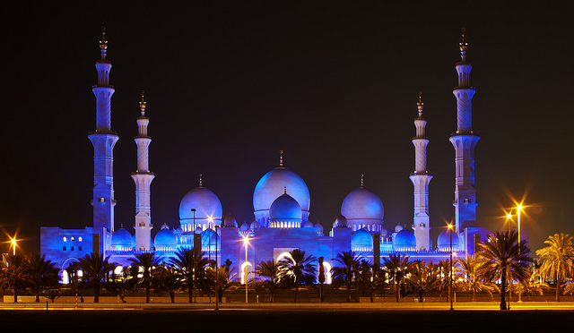 Available for license on Getty Images: www.gettyimages.com/Search/Search.aspx?assettype=image&am... Update: This photo made it to #94 on flickr Explore for June 12, 2009. Thanks all! I have posted photos of this mosque previously, but this is a photo from the opposite side of the mosque. I used an extremely long exposure on this one with a very small aperature. One of the most magnificent structures I have ever seen...the Sheikh Zayed Mosque in Abu Dhabi is lit up at night, but the color will vary depending something to do with the moon (If anyone knows, please tell). This was taken at night (obviously), with a very long exposure. A bit more from Wikipedia: Sheikh Zayed Mosque in Abu Dhabi is the largest mosque in the United Arab Emirates and the sixth largest mosque in the world. It is named after Sheikh Zayed bin Sultan Al Nahyan, the founder and the first President of the United Arab Emirates, who is also buried there. The mosque was officially opened in the Islamic month o