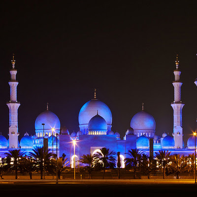 Available for license on Getty Images:www.gettyimages.com/Search/Search.aspx?assettype=image&am...Update: This photo made it to #94 on flickr Explore for June 12, 2009. Thanks all!I have posted photos of this mosque previously, but this is a photo from the opposite side of the mosque. I used an extremely long exposure on this one with a very small aperature.One of the most magnificent structures I have ever seen...the Sheikh Zayed Mosque in Abu Dhabi is lit up at night, but the color will vary depending something to do with the moon (If anyone knows, please tell). This was taken at night (obviously), with a very long exposure.A bit more from Wikipedia:Sheikh Zayed Mosque in Abu Dhabi is the largest mosque in the United Arab Emirates and the sixth largest mosque in the world. It is named after Sheikh Zayed bin Sultan Al Nahyan, the founder and the first President of the United Arab Emirates, who is also buried there. The mosque was officially opened in the Islamic month o 3619017815.jpg
